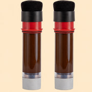 Two dark tan Italian leather shoe cream refills with application sponges