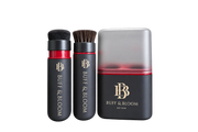Buff & Bloom makeup set featuring a black cylindrical brush with black bristles, a black cylindrical sponge applicator with brown bristles, and a matching rectangular sponge block with a translucent gray top and red gradient base, all on a white background.